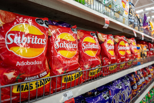 Sabritas Adobadas flavored chips bags on a Walmart shelf. PepsiCo brand, originated in Mexico (founded in 1943). Jalisco, Mexico, December 4, 2025. Lays