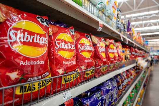 Sabritas Adobadas flavored chips bags on a Walmart shelf. PepsiCo brand, originated in Mexico (founded in 1943). Jalisco, Mexico, December 4, 2025. Lays