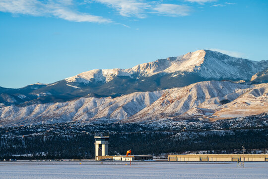Davis Airfield at the United States Airforce Academy, with a snow covered Pikes Peak Mountain in the background.