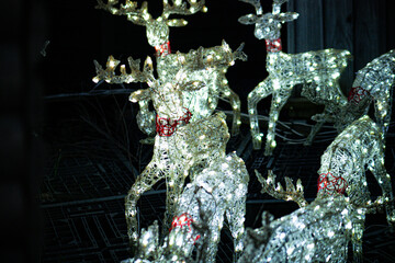 Sparkling reindeer lights in public Christmas setup – cheerful seasonal scene