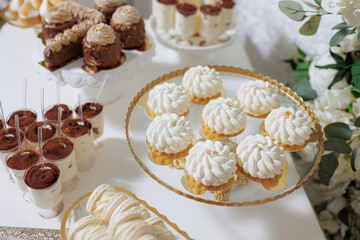 Delightful dessert display at a celebration with elegant treats and decorations