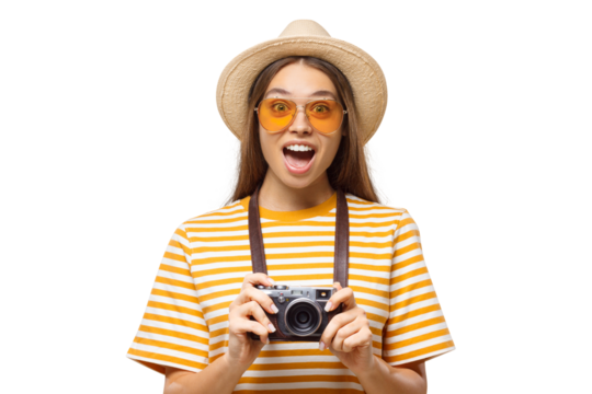 Surprised young woman tourist with camera, expressing wow emotion during summer travel
