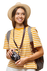 Smiling young tourist with backpack and camera, looking away with joyful travel mood