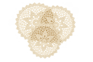 Vintage knitted heart doily presenting intricate lace crochet textile pattern, delicate handmade cream fabric on transparent background