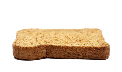 slice whole wheat dry integral bread with wholewheat flour isolated on white background, side view