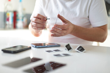 The process of replacing a protective glass on a smartphone