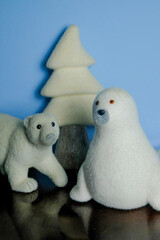  Playful reproductions of polar bears and a seal form a Christmas composition