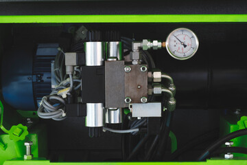 Hydraulic power drive hoses of high pressure machine, industrial power concept background.