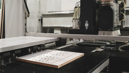 Furniture wood panel making machine in furniture factory, furniture manufacturing industrial concept background.