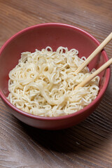 Close-Up of Instant Noodles in a Red Bowl