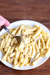 Close-Up of Creamy Italian Caserecce Pasta