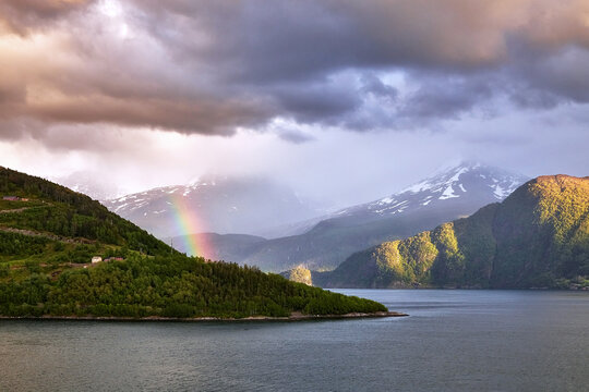 Rainbow over Nordfjord Mountains in Norway