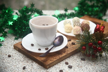 cup of coffee and christmas candy