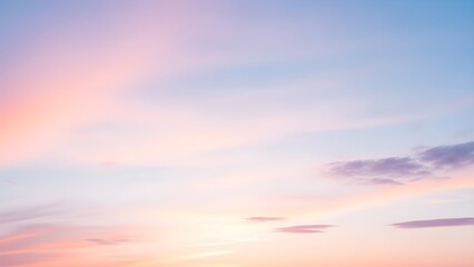 Breathtaking pastel gradient sky at dawn or dusk, featuring soft clouds painted with tranquil shades of pink, blue, and purple, creating a serene and ethereal natural backdrop for peaceful moments