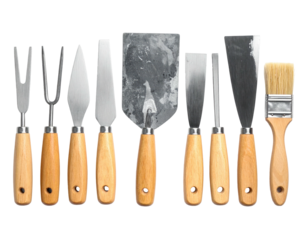 Assortment of gardening and construction tools laid out neatly against a stark black background