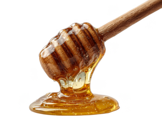Honey dripping from a wooden dipper with a smooth flow on a clear background captured in a kitchen setting