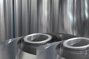 two rolls of aluminum metal material. thin metal