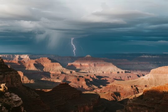 Lightning strikes over a vast canyon landscape under stormy skies