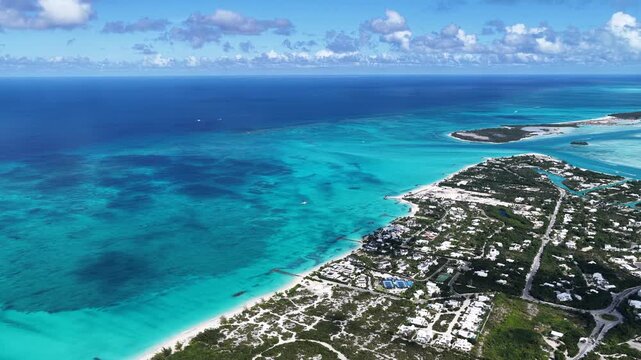 Grace Bay Beach At Providenciales In Overseas Territory Turks And Caicos Islands. Caribbean Beach. Tropical Scenery. Stunning Highrise Buildings. Grace Bay Beach In Turks And Caicos Islands. 