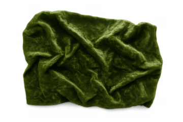 Crumpled green velvet fabric creating soft texture with rich folds, luxurious plush textile material on transparent background