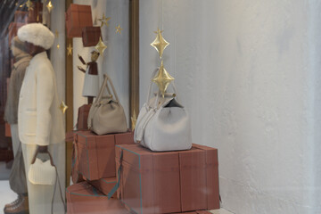 Fototapeta premium display window with mannequins at Loro Piana, a clothing store, located at 111 Bloor St W, Toronto