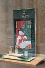 Fototapeta premium hand‑crafted holiday display by Rolex’s Roldeco studio, featuring festive snowman figure in leather and fabric at Rolex Boutique at Royal de Versailles Jewellers, 101 Bloor St W, Toronto