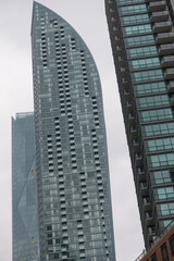 Naklejka premium view of L‑Tower, a residential skyscraper designed by Daniel Libeskind, completed in 2016, located at 8 The Esplanade, Toronto