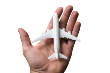 Toy airplane on a human hand isolated on transparent background, travel concept