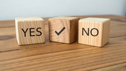 Wooden Blocks with Engraved YES and NO Text on a Table, Symbolizing Decision Making and Choices in Life