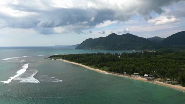 Lhoknga coastline, sea aerial view at Lampuuk beach by drone in Aceh, Indonesia. popular for surfing waves and surfers.