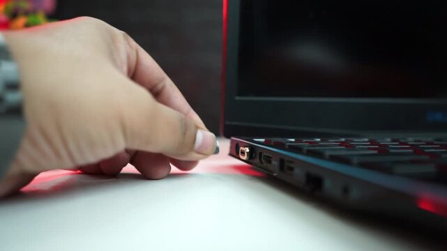 Magnetic type C male to female connector inserting into laptop's port