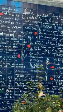 The Wall of Love, with the phrase I love you written in different languages, Montmartre, Paris, France, October 15, 2025. High quality 4k footage