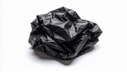 Crumpled black plastic bag on white background, representing waste, recycling, and environmental concerns.