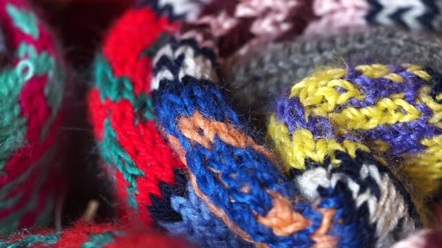 Knitting a colorful spiral pattern with yarn