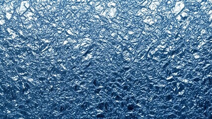 Detailed close up of crumpled blue aluminum foil texture for background use