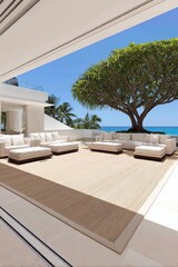 Beautiful outdoor living space with modern furniture and ocean view, perfect for relaxation and gatherings.
