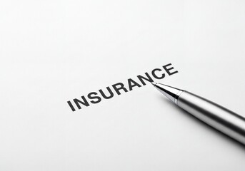 Obraz premium Important Insurance Document Details with a Pen, Highlighting the Key Policy Term