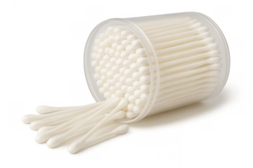 Cotton swabs spilling from a transparent plastic container, showing personal hygiene and cosmetic cleaning tools