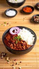 Rice & chili in bowl on bamboo mat