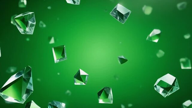 A green screen background with scattered, shiny, faceted diamonds in various sizes and orientations, with a bright light source in the center.