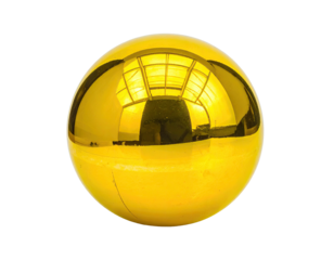 A gleaming golden sphere with reflections of an interior space. Isolated on a black background