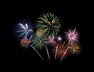Festive colorful fireworks display isolated on black background for celebration and anniversary
