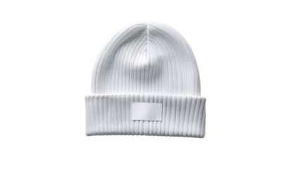 A ribbed knit white beanie hat with a small rectangular label on the brim isolated on a bright white surface clean white background cutout