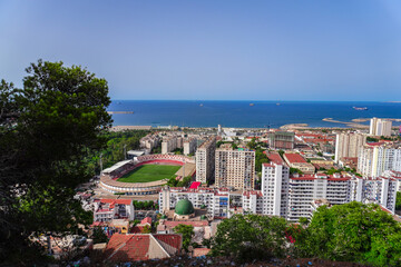 Alger the capital city of Algeria, North Africa, city centre of Algiers, the capital of Algeria, Landscape of Algiers city With port and mediterranean sea and white buildings, Arab Maghreb Africa.
