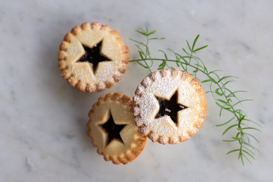 three baked fruit mince pies, a traditional christmas food