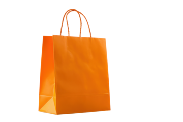 Single orange paper shopping bag with twisted handles on black background gift, Png On White Background, Isolated on Transparent Background, Cut Out
