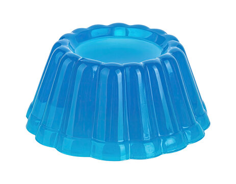 A vibrant, translucent, fluted, azure blue gelatin mold. Isolated on a solid black backdrop