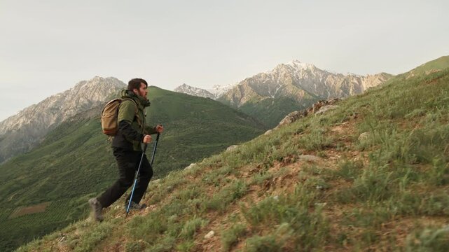 Traveler hiking uphill in mountains with backpack concept of inner strength balance freedom mindfulness exploration self discovery motivation nature connection and peaceful journey