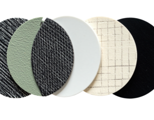 A group of circular pieces of textured and colored materials, arranged together