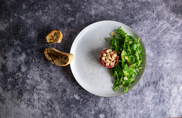 Beef Carpaccio cold appetizer with parmesan
